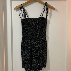 black romper with white polka dots